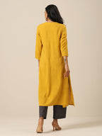 trueBrowns Mustard Yellow Slub Texture Neck Pleat Kurta Pant Set | Grocsy