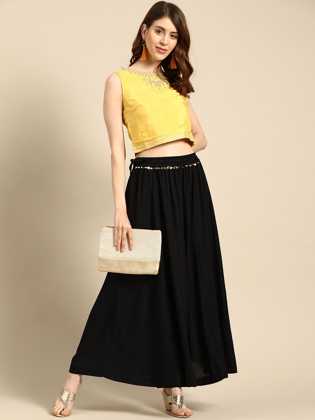 TAG 7 Women Black & Maroon Solid Flared Palazzos | Grocsy