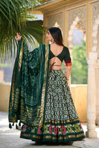 Vastranavya Designer Ikkat Print With Foil Work Lehenga Choli - Green | Grocsy