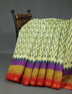 Shades of Light Apple Green And Orange Colour Blouse Ikat Design Semi Chanderi Saree By Gayathri Reddy Designer Studio | Grocsy