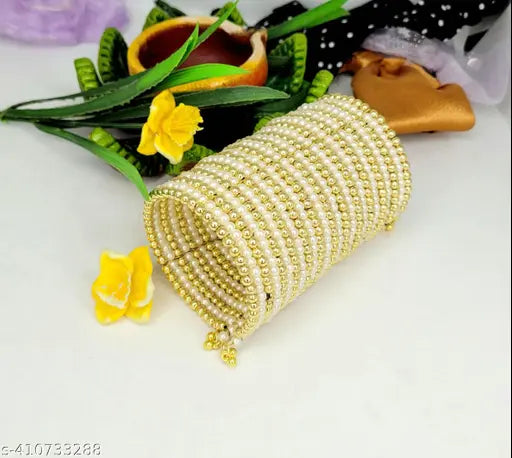 Tehzeeb Creations Women's Spiral Bangle With Golden And White Pearl | Grocsy