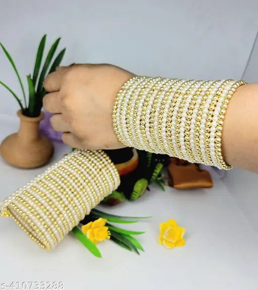 Tehzeeb Creations Women's Spiral Bangle With Golden And White Pearl | Grocsy