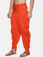 Sethukrishna Men Orange Solid Dhoti Pants | Grocsy