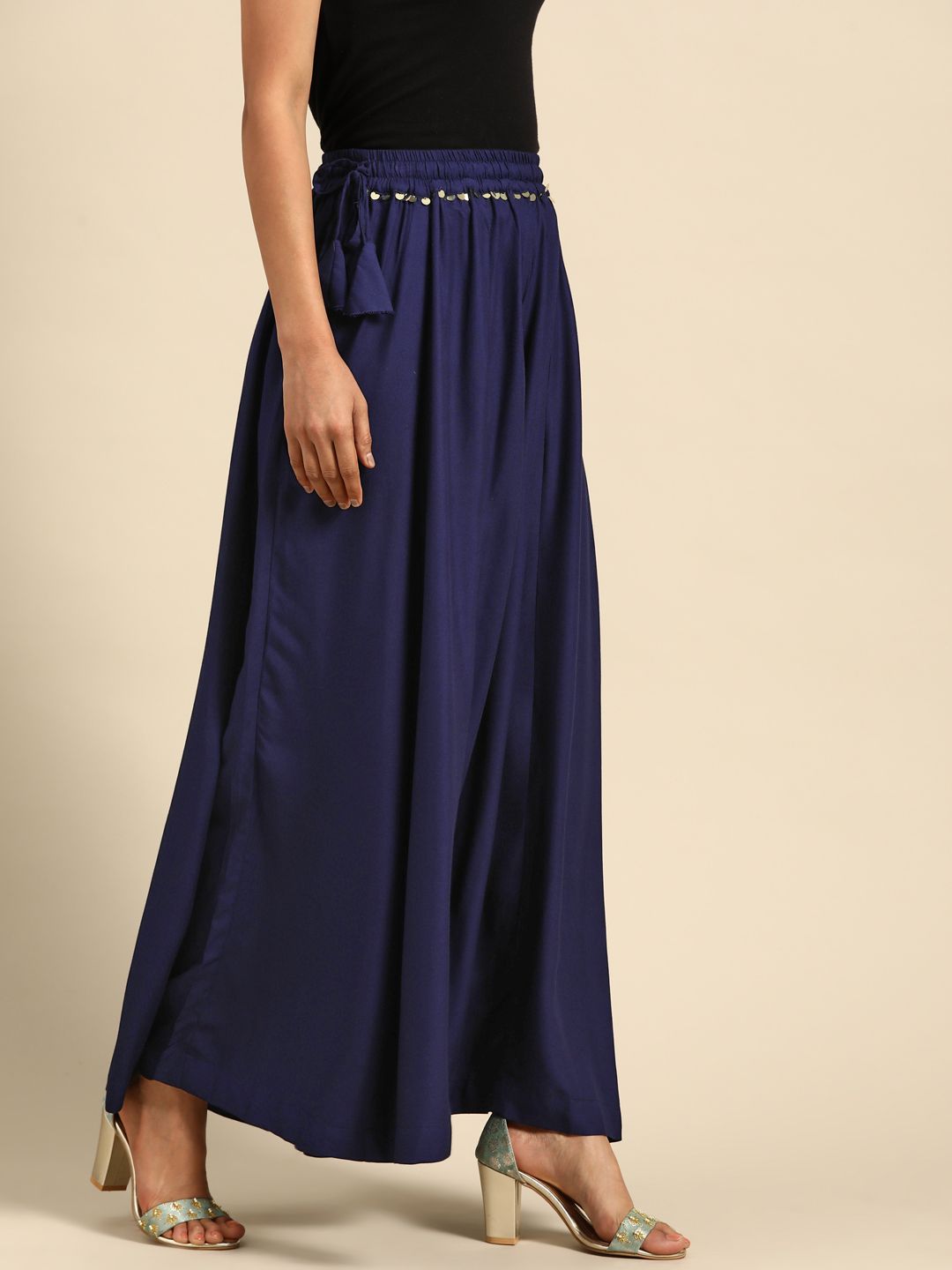 TAG 7 Women Navy Blue Solid Flared Palazzos | Grocsy
