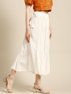 TAG 7 Women White Solid Crushed Flared Cropped Palazzos | Grocsy