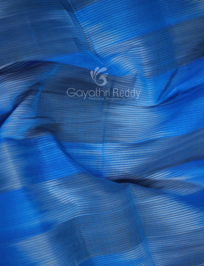 Dual Shades of Sky Blue And Maroon Mangalagiri Ikkat Cotton Saree By Gayathri Reddy Designer Studio | Grocsy