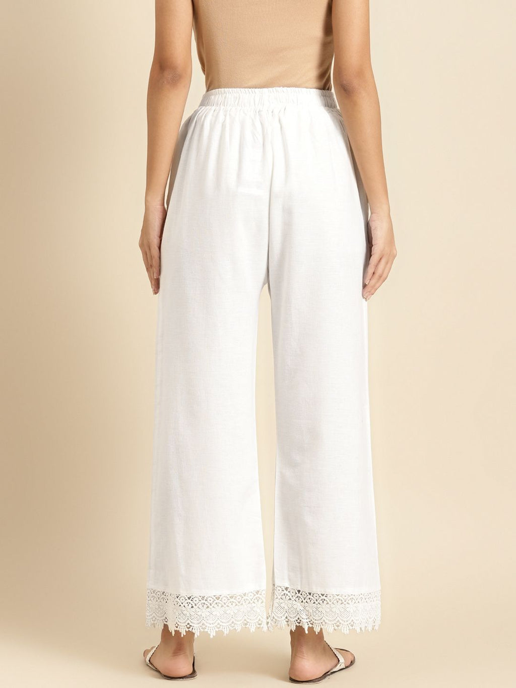 TAG 7 Women White Solid Hem Design Straight Palazzos | Grocsy