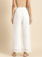 TAG 7 Women White Solid Hem Design Straight Palazzos | Grocsy