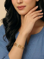 NVR Women Set of 4 Gold Plated Handcrafted CZ Studded Bangle | Grocsy