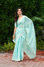 Vastranavya Turquoise Embroidery Work Shimmer Chiffon Saree with Unstitched Blouse | Grocsy