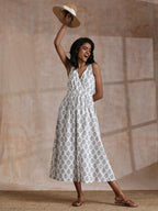 trueBrowns Green Buta On White Block Print Cotton Sleeveless Wrap Dress | Grocsy