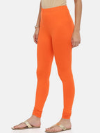 Souchii Orange Solid Slim-Fit Churidar-Length Leggings | Grocsy
