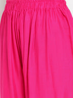 TAG 7 Women Pink Solid Flared Palazzos | Grocsy