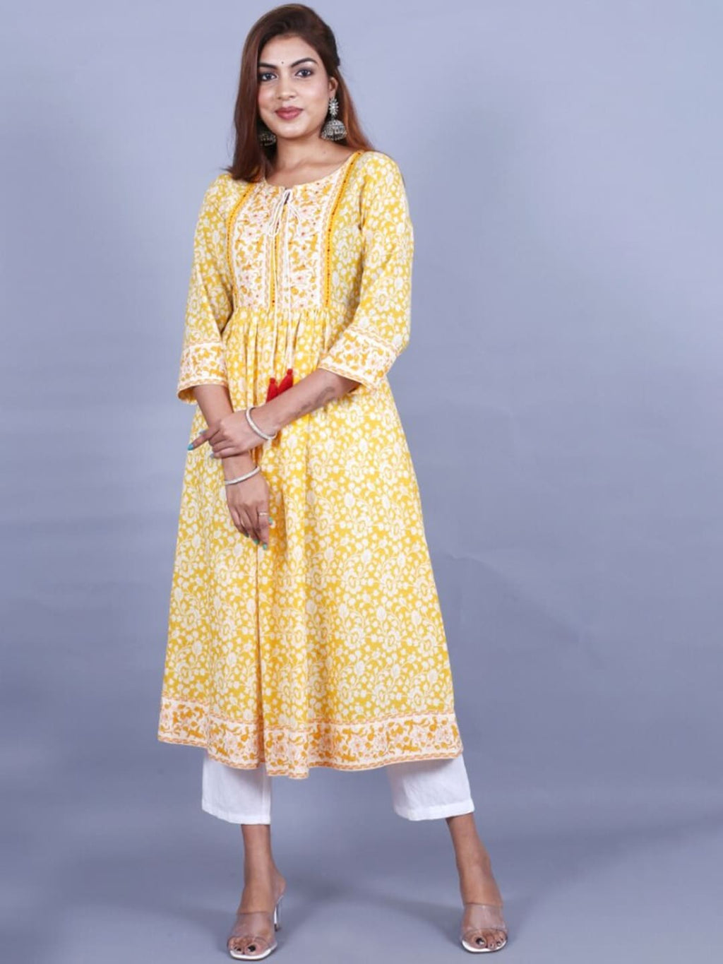 HERE&NOW Women Yellow Floral Printed Sequined A-Line Kurta with Trousers | Grocsy