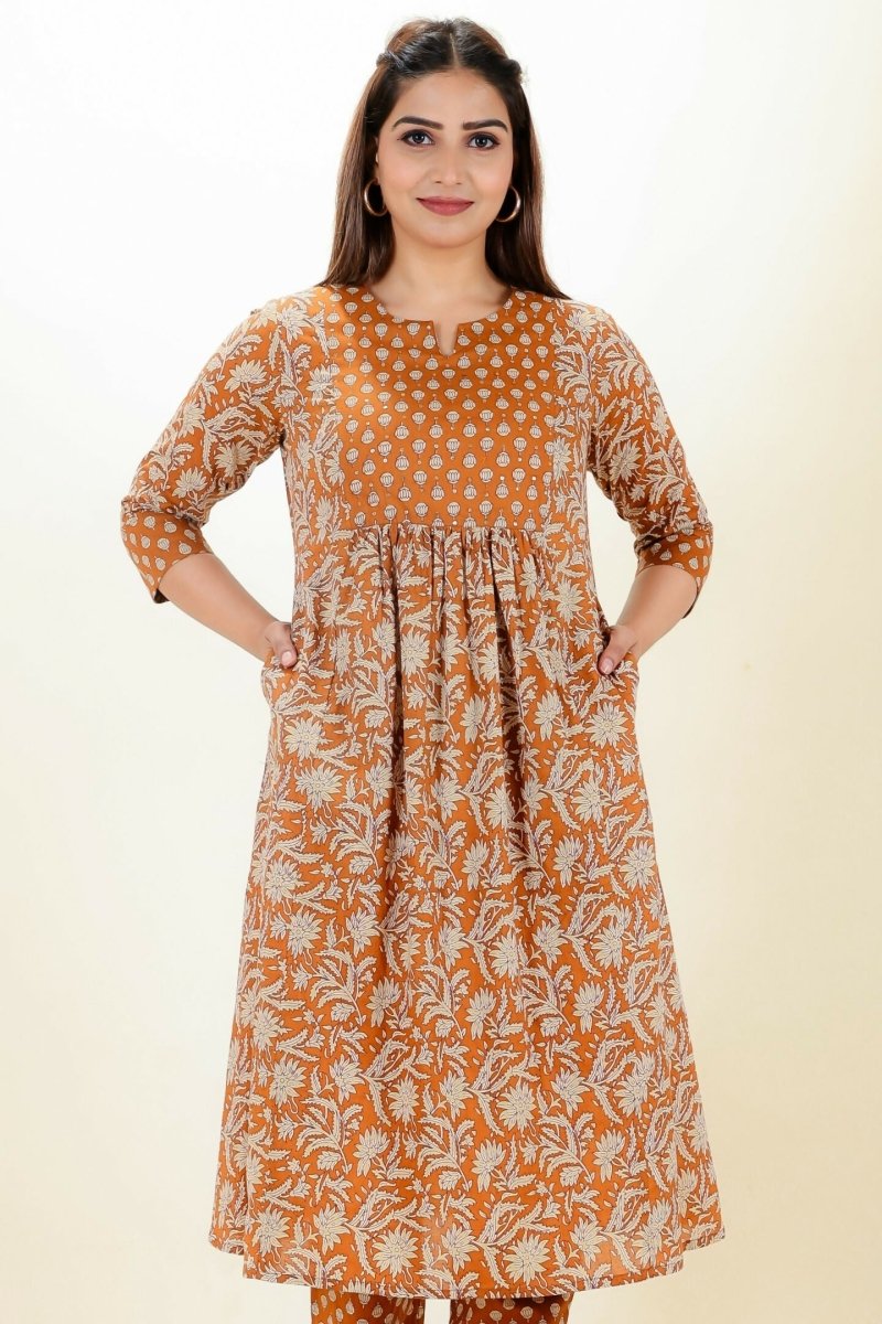 Aramya Orange Soft Cotton Floral Panelled Kurta for Women | Grocsy