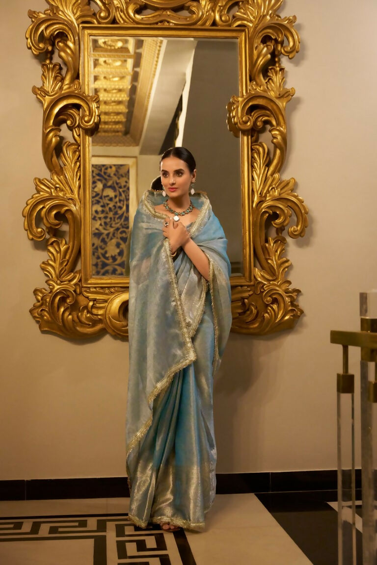 Vastranavya Sea Blue Tissue Shimmer Zari Weaving Work Saree with Unstitched Blouse | Grocsy