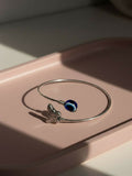NVR Women Rhodium Plated Evil Eye Kada Bracelet | Grocsy