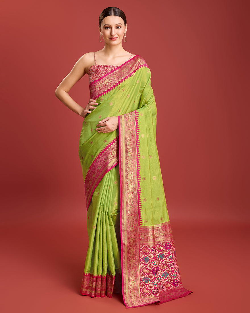 Monjolika Fashion Exquisite Designs With This Regal Parrot Green Patola Pallu Banarasi Tissue Silk Saree | Grocsy