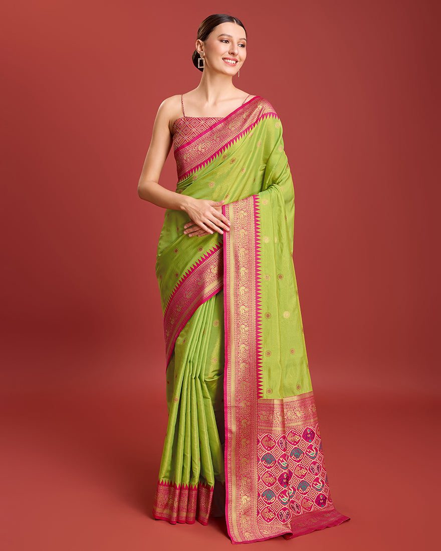 Monjolika Fashion Exquisite Designs With This Regal Parrot Green Patola Pallu Banarasi Tissue Silk Saree | Grocsy