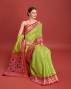 Monjolika Fashion Exquisite Designs With This Regal Parrot Green Patola Pallu Banarasi Tissue Silk Saree | Grocsy