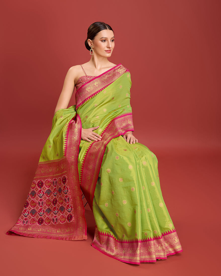 Monjolika Fashion Exquisite Designs With This Regal Parrot Green Patola Pallu Banarasi Tissue Silk Saree | Grocsy