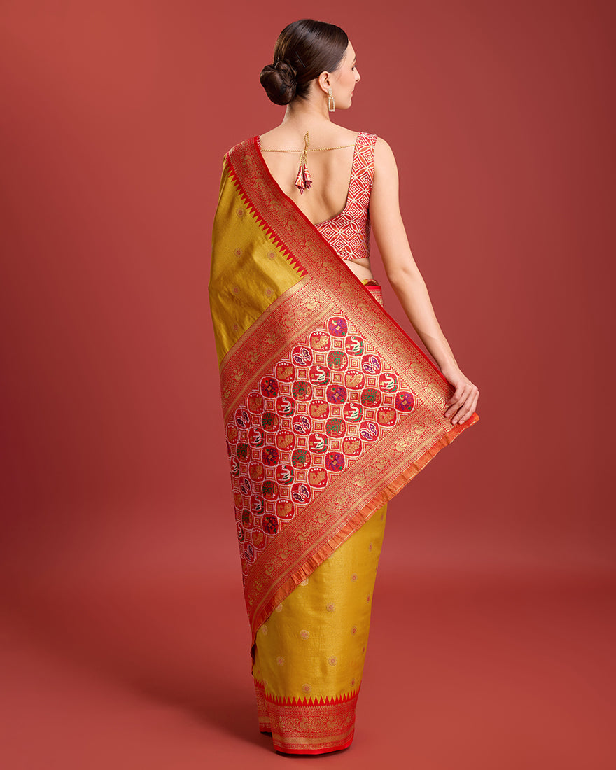 Monjolika Fashion Exquisite Designs With This Regal Mustard Color Patola Pallu Banarasi Tissue Silk Saree | Grocsy