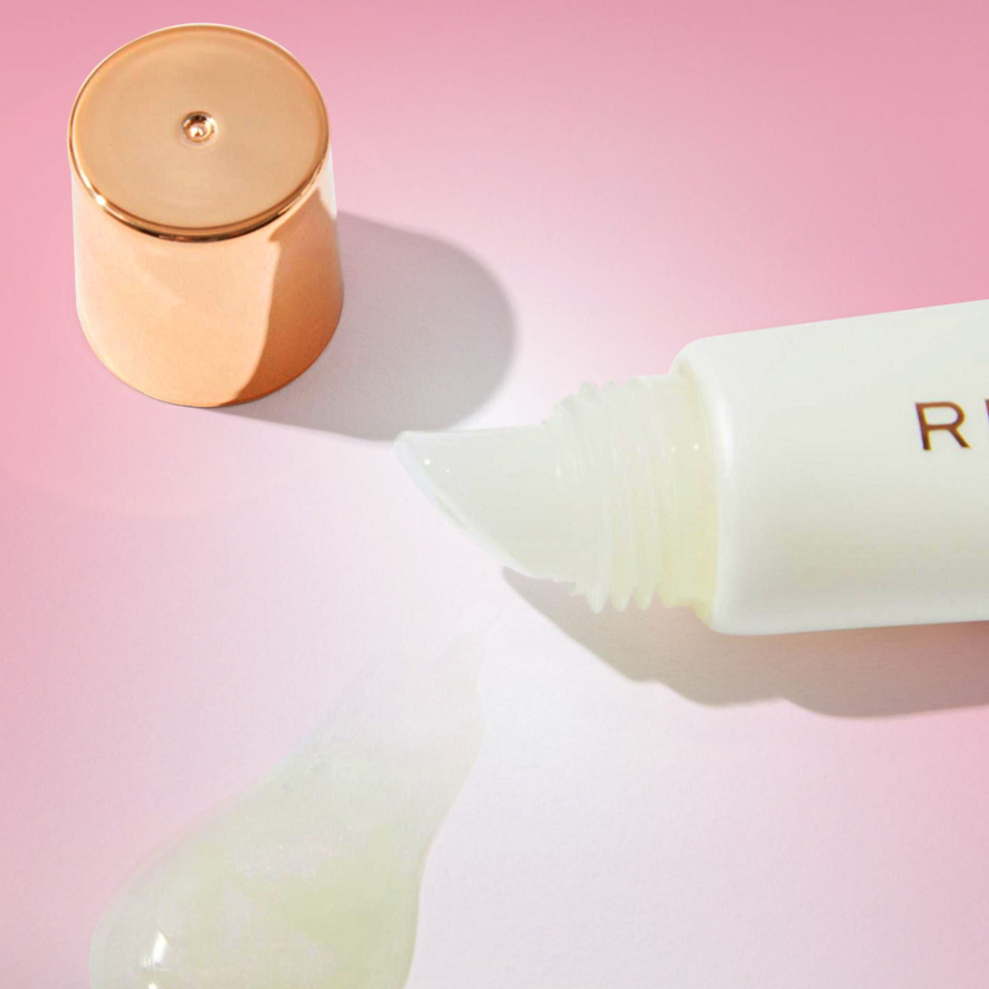 Makeup Revolution Juicy Peptide Lip Balm - Clear Ice | Grocsy