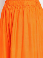 TAG 7 Women Orange Solid Flared Palazzos | Grocsy