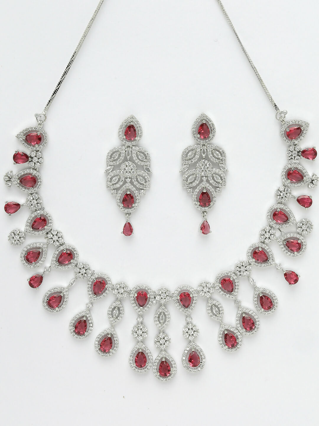 NVR Women's silver plated Maroon CZ stone handcrafted jewellery set | Grocsy