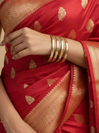 NVR Women Set of 4 Gold Plated CZ Toned Bangle | Grocsy