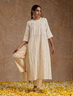 trueBrowns Ivory Gold Cotton Neck Pleat Kurta Set | Grocsy