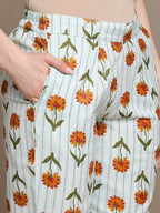 HERE&NOW Floral Printed Lace Inserted V-Neck Kurti with Trousers | Grocsy