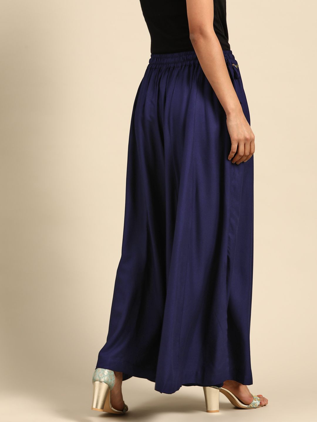 TAG 7 Women Navy Blue Solid Flared Palazzos | Grocsy