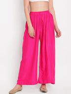 TAG 7 Women Pink Solid Flared Palazzos | Grocsy
