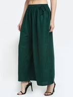 TAG 7 Women Green Solid Flared Palazzos | Grocsy