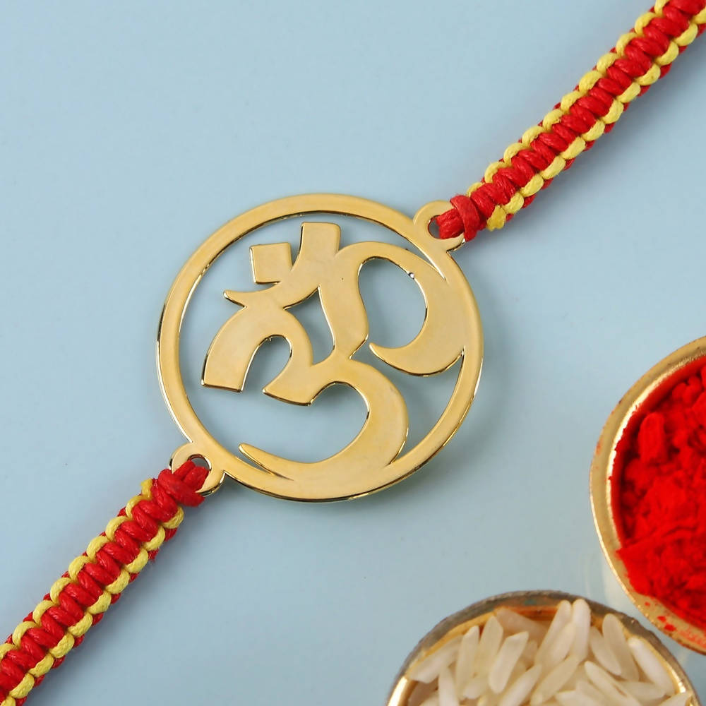 Ethnic Om Metal Rakhi & Dairy Milk Chocolates | Grocsy