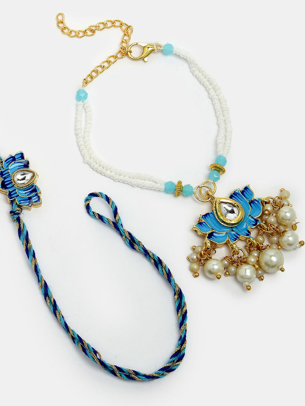 NVR Women & Men Set of 2 Blue Lotus Shape Kundan-Studded & Beaded Handcrafted Wraparound Rakhi Set With Roli Chawal | Grocsy