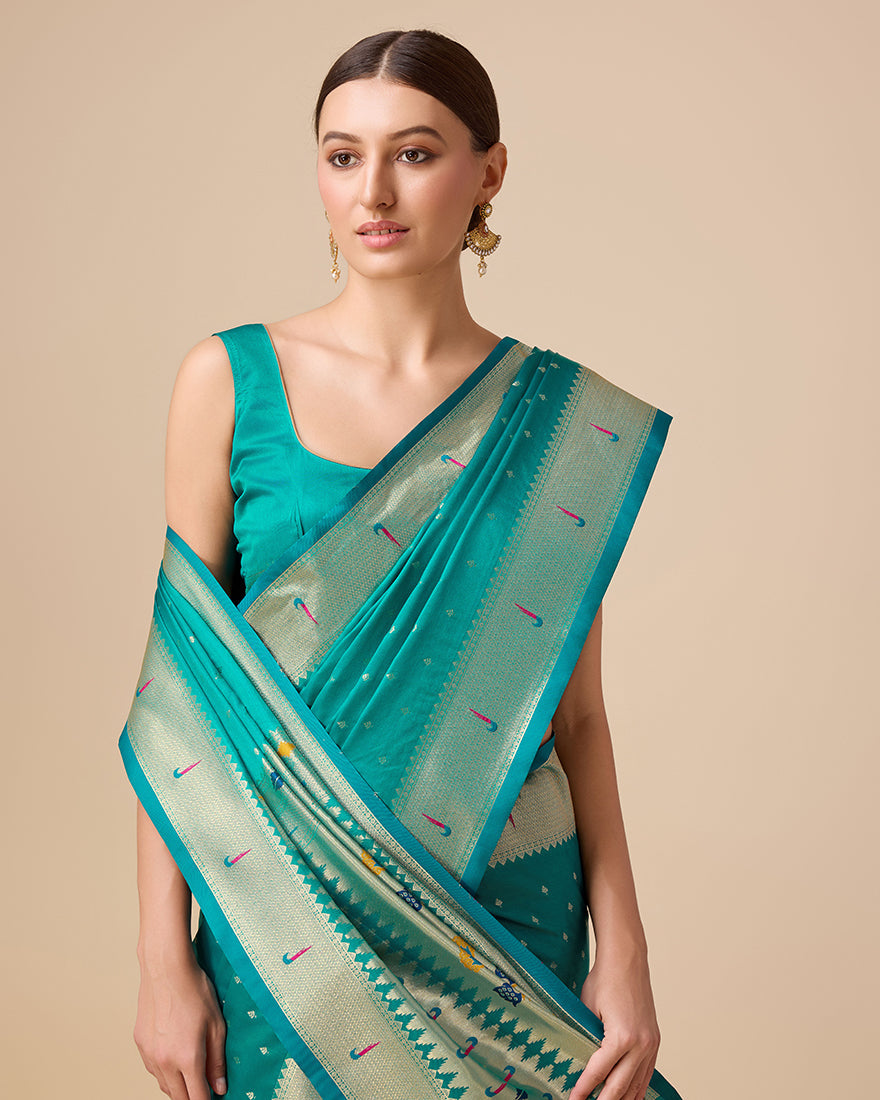 Monjolika Fashion Opulent Paithani In Regal Turquoise Color With Gold Weaves Delicate Zari Work Silk Saree | Grocsy