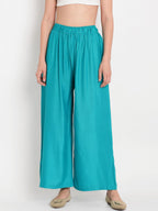TAG 7 Women Turquoise Blue Solid Flared Palazzos | Grocsy