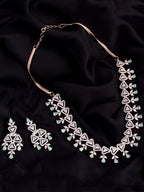 Saraf RS Jewellery Rose Gold-Polished White & Sea Green AD-Studded Handcrafted Jewellery Set | Grocsy