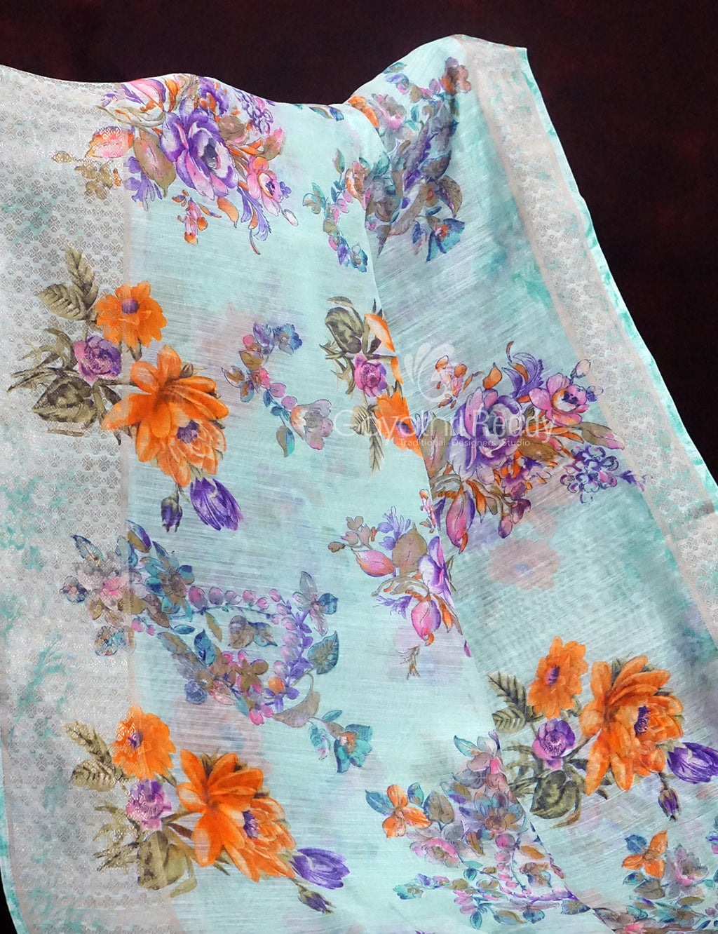 Shades of Sky Blue With Orange Blouse Floral Design Semi Chanderi Saree By Gayathri Reddy Designer Studio | Grocsy