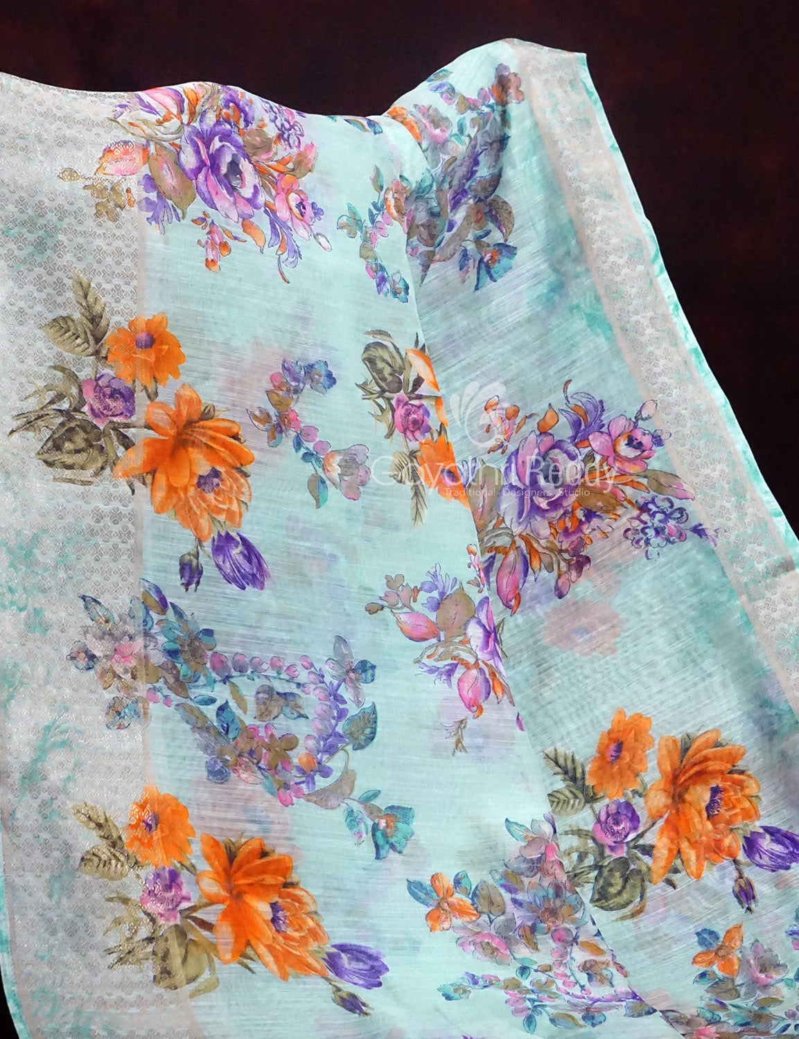 Shades of Sky Blue With Orange Blouse Floral Design Semi Chanderi Saree By Gayathri Reddy Designer Studio | Grocsy