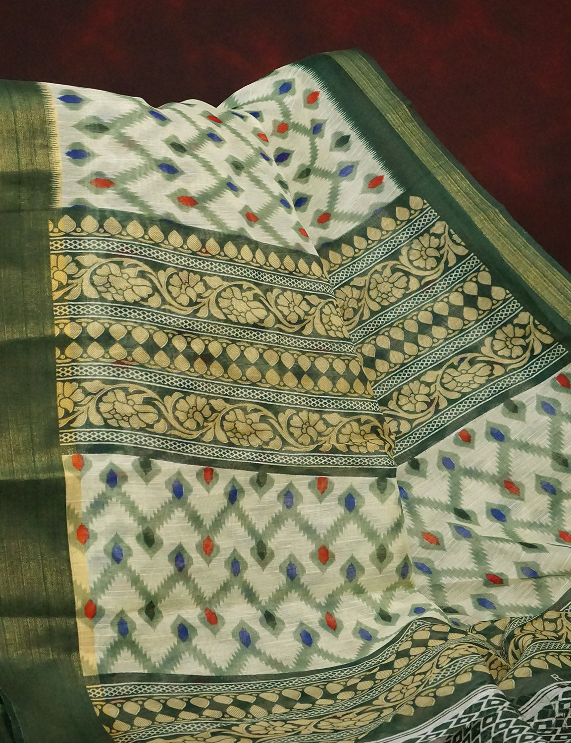 Half White And Parrot Green Colour Ikat Design Semi Chanderi Saree By Gayathri Reddy Designer Studio | Grocsy