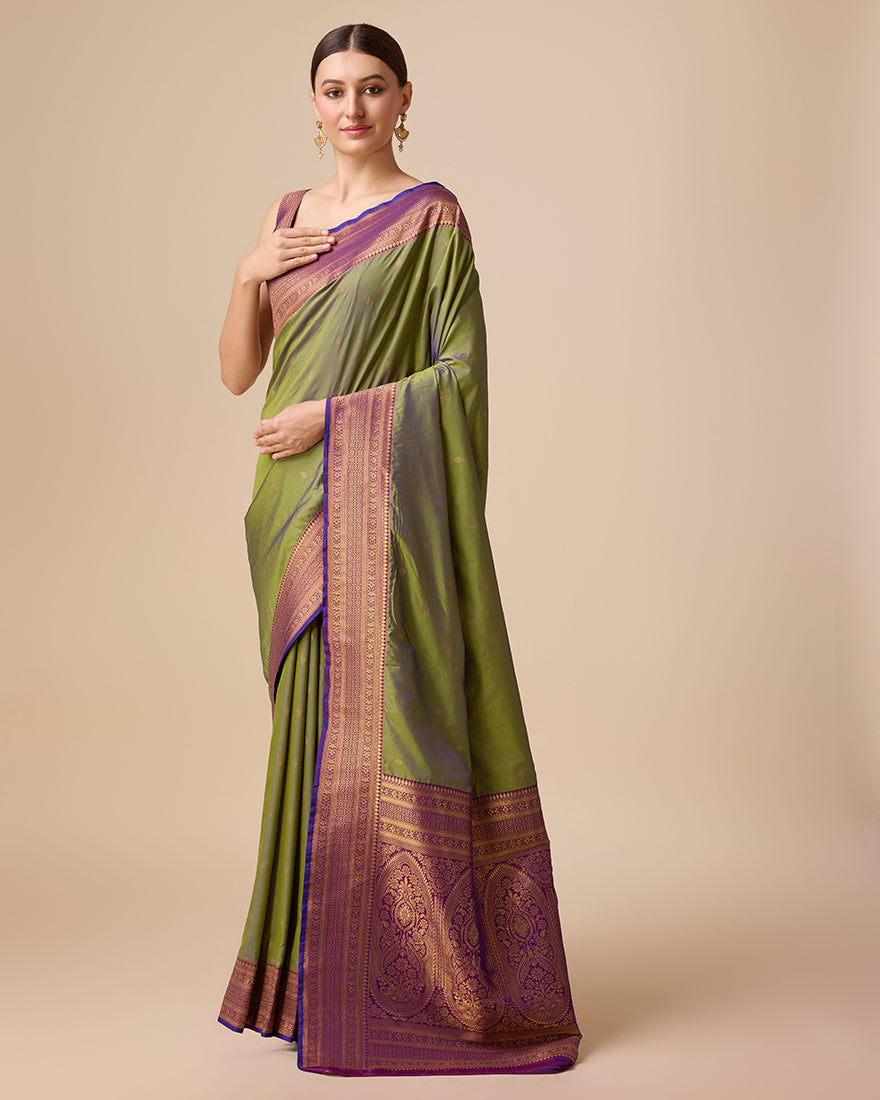 Monjolika Fashion Elegant Olive Green Banarasi With Intricate Zari Work With Rich Brocade Patterns Silk Saree | Grocsy