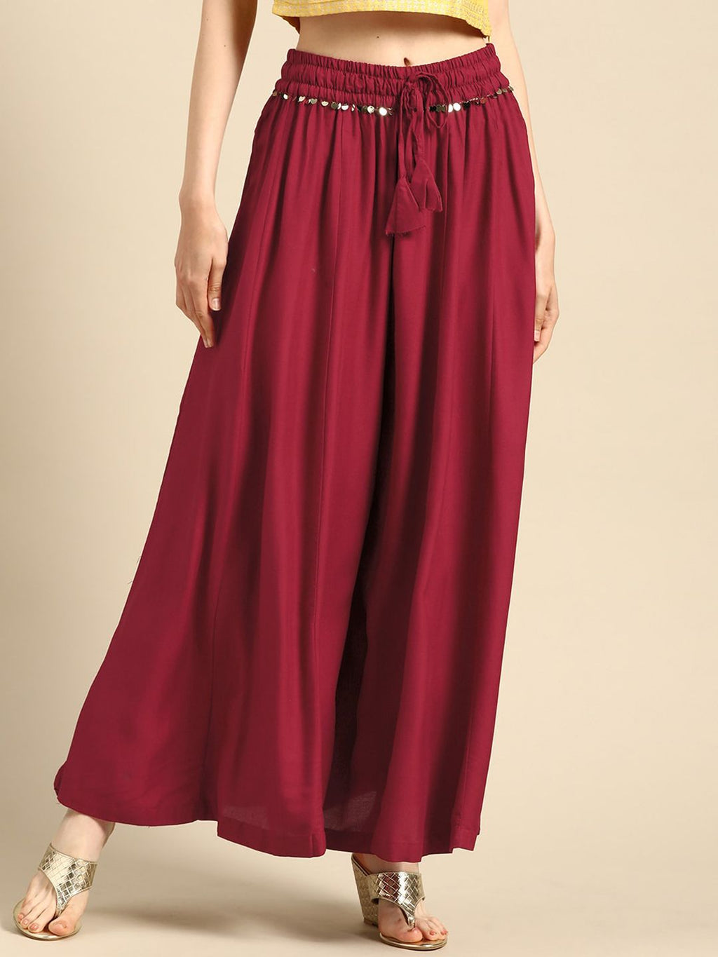 TAG 7 Women Black & Maroon Solid Flared Palazzos | Grocsy