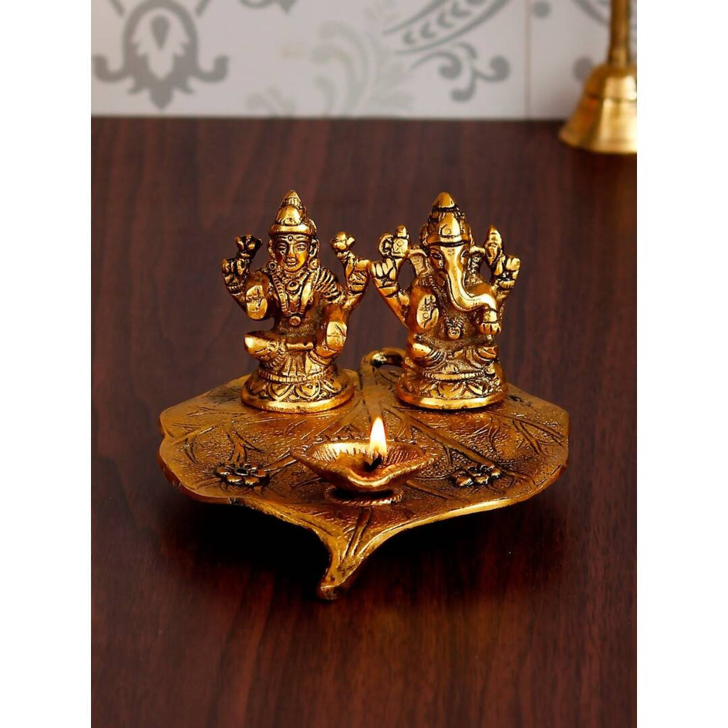eCraftIndia Antique Gold-Toned Metal Handcrafted Laxmi Ganesh With Diya On Leaf | Grocsy