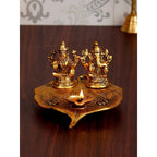 eCraftIndia Antique Gold-Toned Metal Handcrafted Laxmi Ganesh With Diya On Leaf | Grocsy