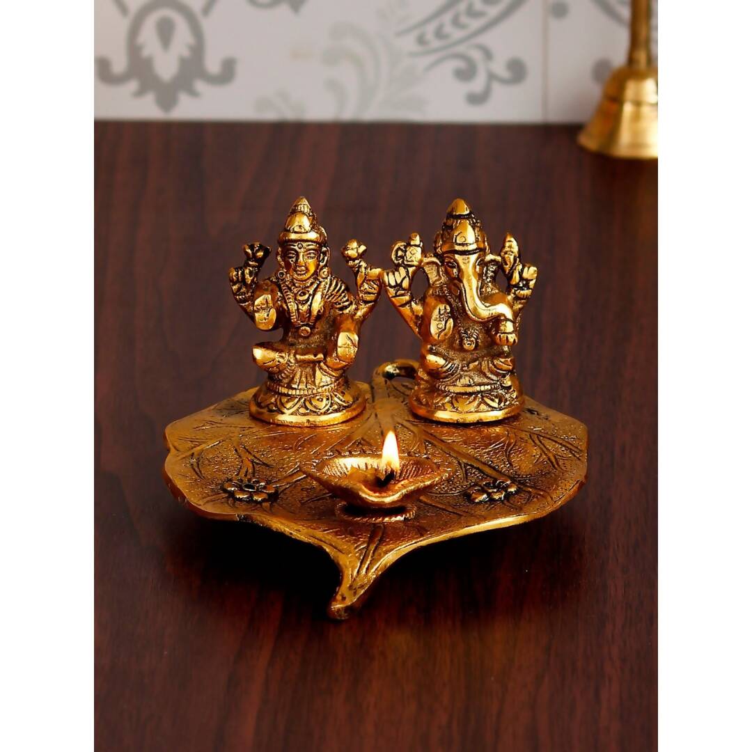 eCraftIndia Antique Gold-Toned Metal Handcrafted Laxmi Ganesh With Diya On Leaf | Grocsy