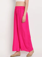 TAG 7 Women Pink Solid Flared Palazzos | Grocsy