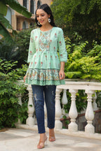 Juniper Pista Green Floral Printed Pure Cotton Peplum Tunic With Lace | Grocsy